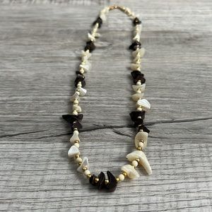 Brown and cream glass stone multi shaped shards with gold tone accents necklace